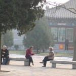 IMG_8858 Two Women Sitting on a Park Bench Talking on www.adventuresinexpatland.com